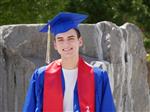 graduate in cap and gown 